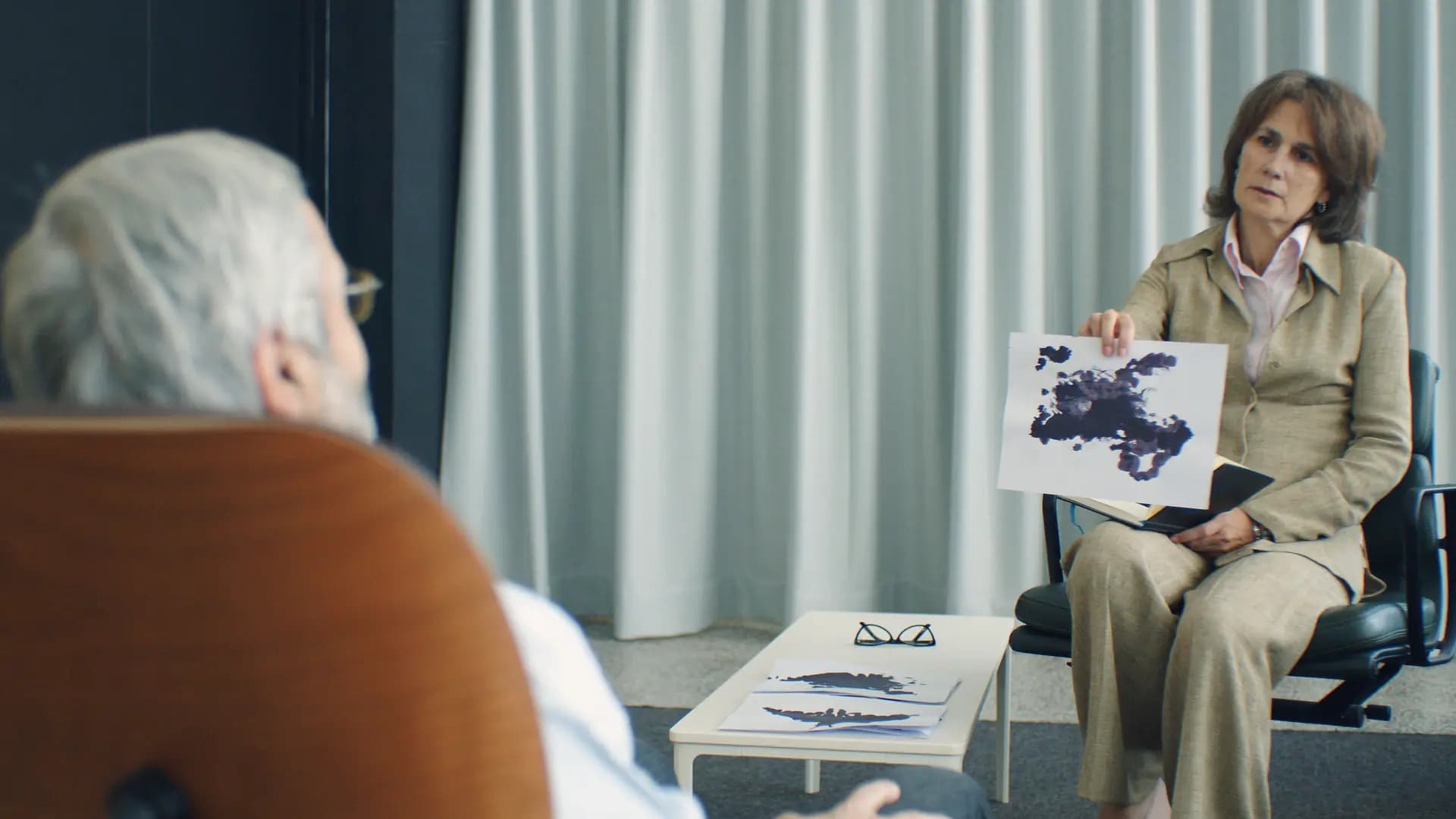 Psychologist conducting a session with a patient