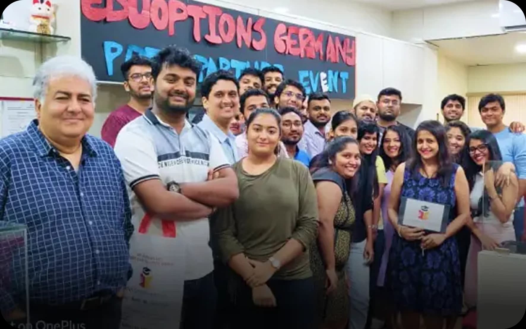 EduOptions Germany students celebrating pre-departure event at Mumbai office