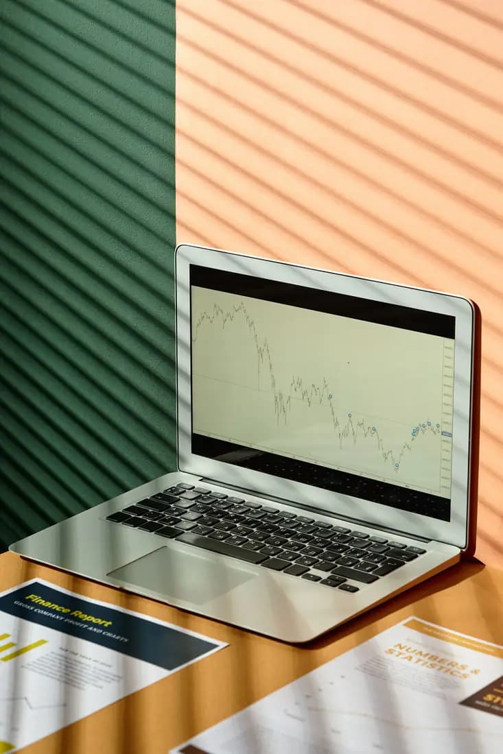 Laptop displaying a data chart